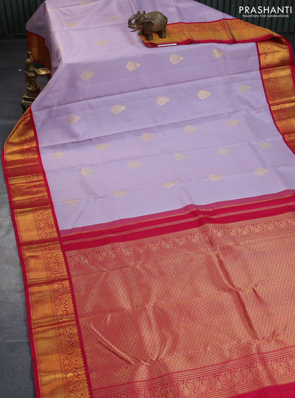 Pure kanchipuram silk saree lavender shade and pink with zari woven buttas and zari woven korvai border