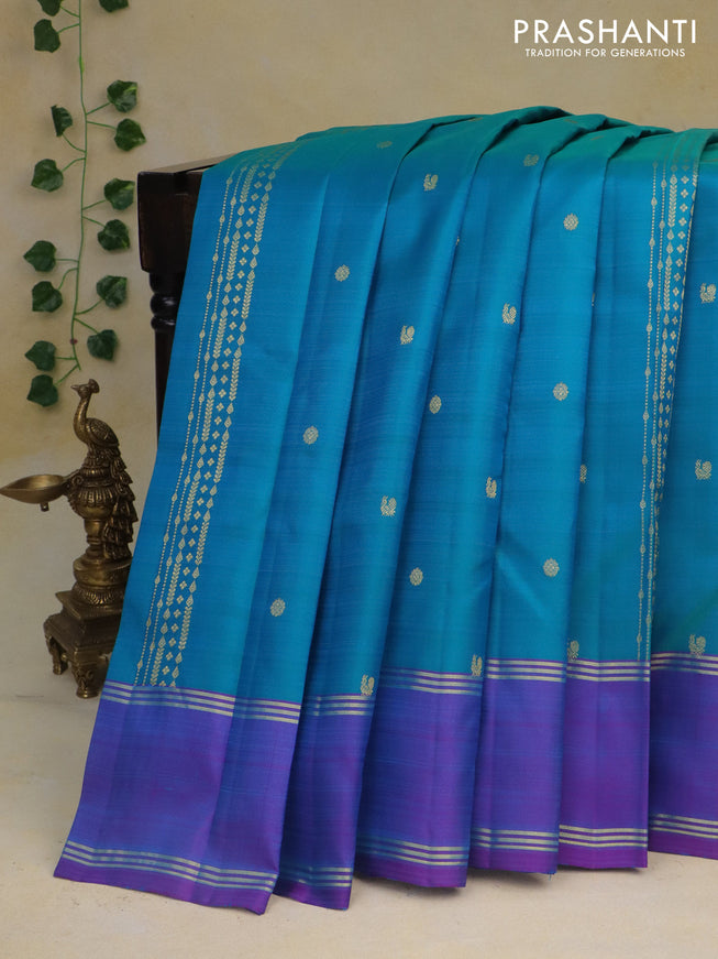 Pure kanchipuram silk saree dual shade of teal blue and dual shade of purple with zari woven buttas and rettapet zari woven border