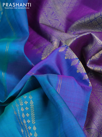 Pure kanchipuram silk saree dual shade of teal blue and dual shade of purple with zari woven buttas and rettapet zari woven border