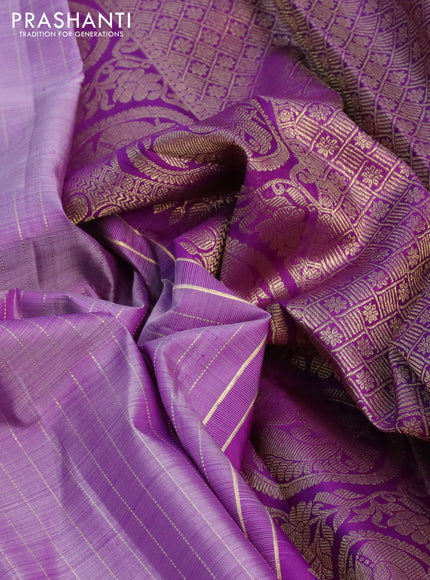 Pure kanchipuram silk saree pastel lavender and violet with allover zari weaves and zari woven butta border