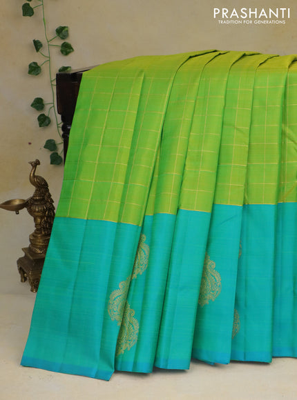 Pure kanchipuram silk saree light green and teal blue with allover zari checked pattern and zari woven butta border