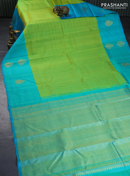 Pure kanchipuram silk saree light green and teal blue with allover zari checked pattern and zari woven butta border