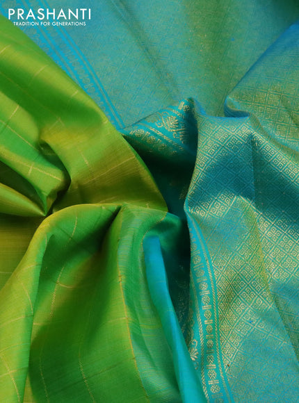 Pure kanchipuram silk saree light green and teal blue with allover zari checked pattern and zari woven butta border