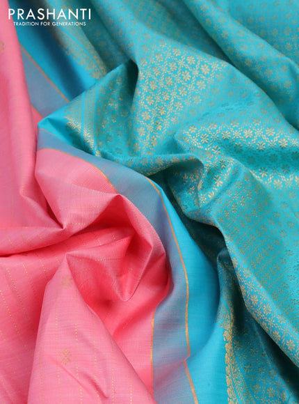 Pure kanchipuram silk saree peach pink and teal blue with allover zari weaves & buttas in borderless style