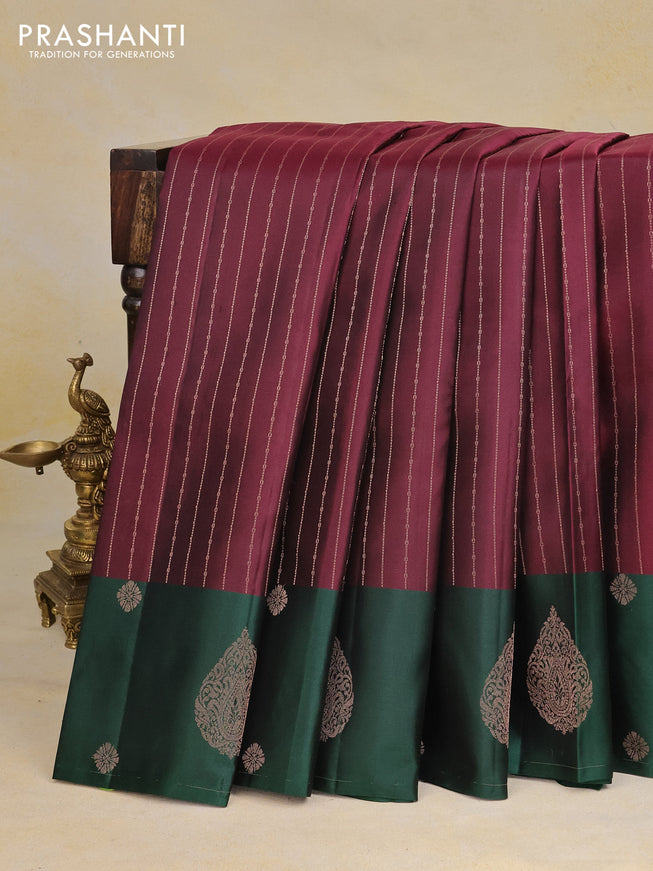 Pure kanchipuram silk saree deep maroon and bottle green with allover copper zari weaves and zari woven butta border