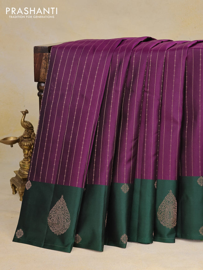 Pure kanchipuram silk saree purple and bottle green with allover copper zari weaves and zari woven butta border