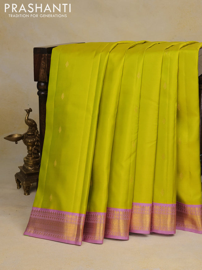 Pure kanchipuram silk saree lime green and pastel lavender with zari woven buttas and zari woven korvai border