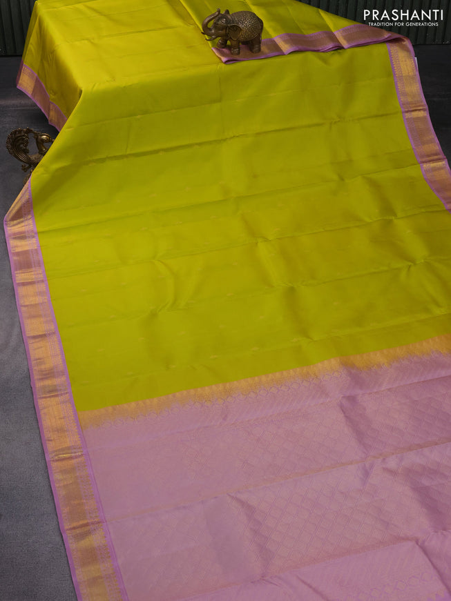 Pure kanchipuram silk saree lime green and pastel lavender with zari woven buttas and zari woven korvai border