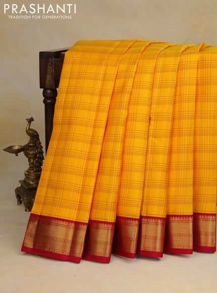 Pure kanchipuram silk saree mango yellow and pink with allover checked pattern and zari woven korvai border