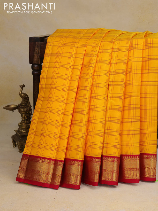 Pure kanchipuram silk saree mango yellow and pink with allover checked pattern and zari woven korvai border