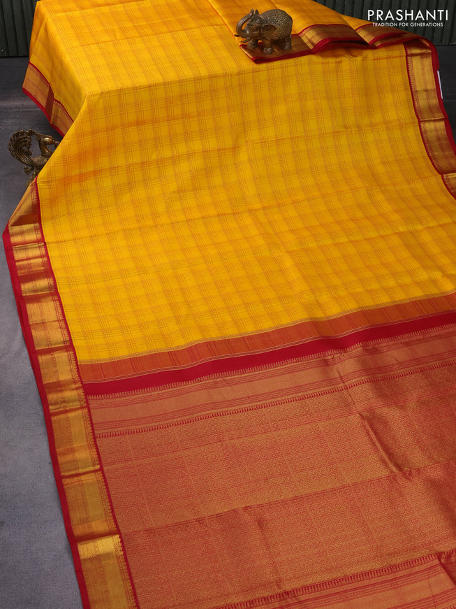 Pure kanchipuram silk saree mango yellow and pink with allover checked pattern and zari woven korvai border