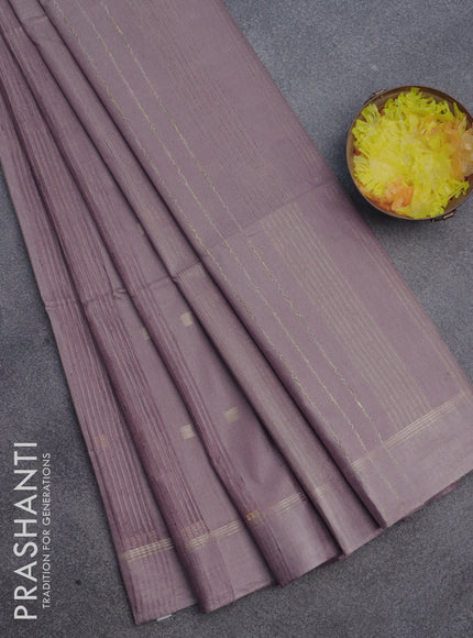 Semi bamboo saree pastel brown with allover zari woven buttas and zari woven simple border