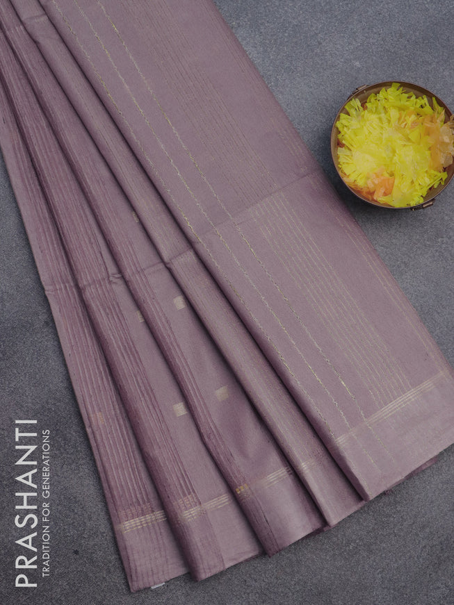 Semi bamboo saree pastel brown with allover zari woven buttas and zari woven simple border