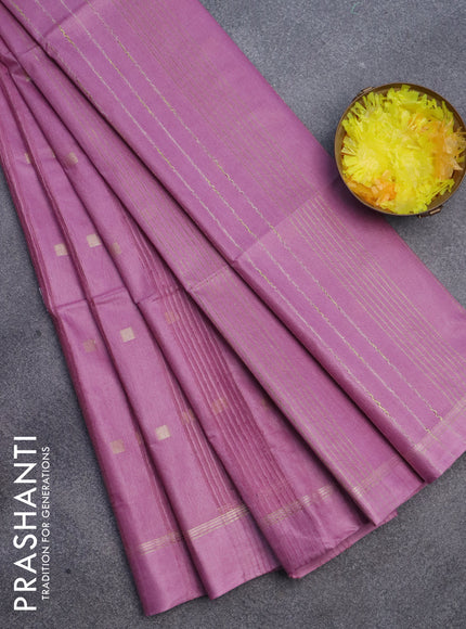 Semi bamboo saree lavender shade with allover zari woven buttas and zari woven simple border