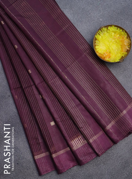 Semi bamboo saree wine shade with allover zari woven buttas and zari woven simple border