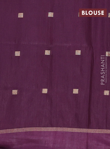 Semi bamboo saree wine shade with allover zari woven buttas and zari woven simple border