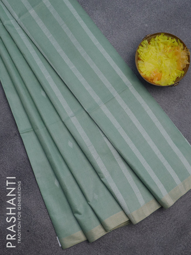 Semi bamboo saree pastel blue with allover thread woven buttas and small zari woven border