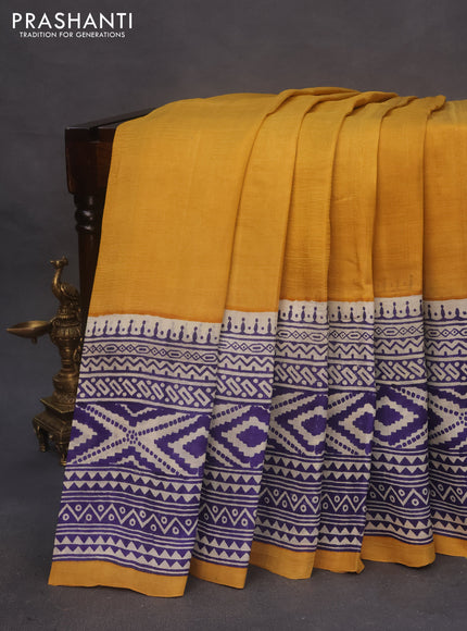 Bishnupuri silk saree mustard yellow and off white blue with plain body and long printed border