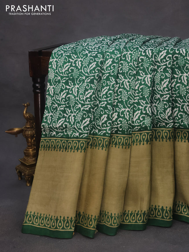 Bishnupuri silk saree green and elaichi green with allover prints and long rettapet border