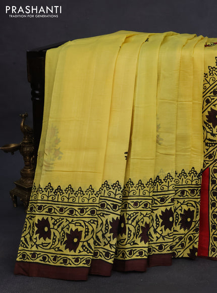 Bishnupuri silk saree yellow and brown with butta prints and printed border