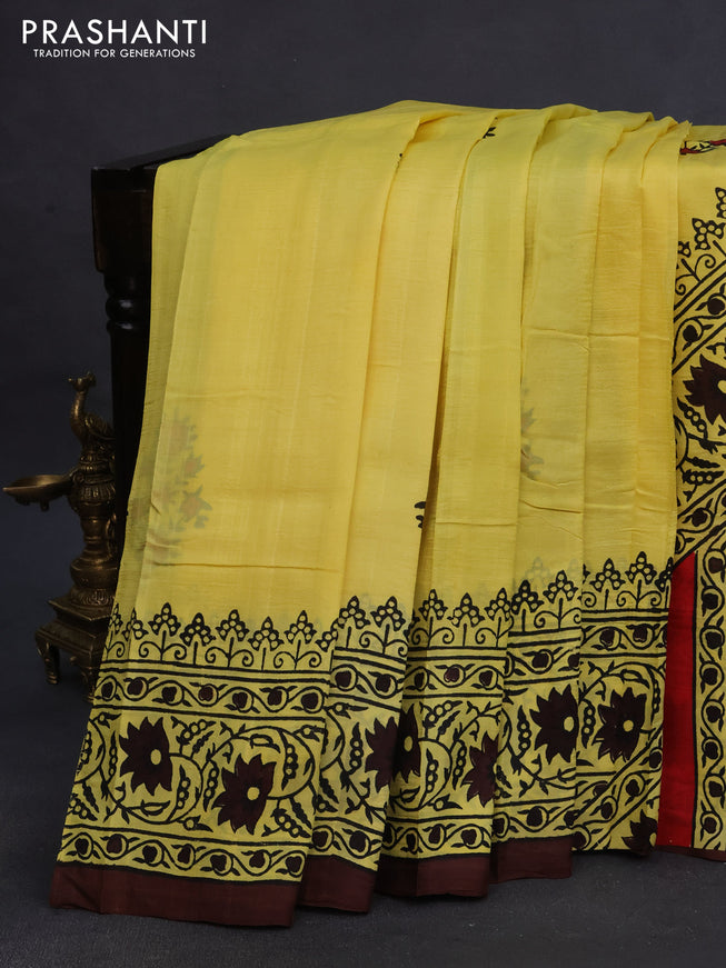 Bishnupuri silk saree yellow and brown with butta prints and printed border