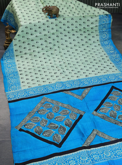 Bishnupuri silk saree pastel green and cs blue with floral butta prints and printed border