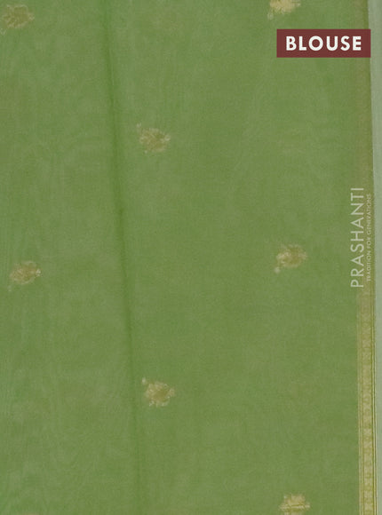 Munga cotton saree pista green with thread & zari woven floral buttas in borderless style