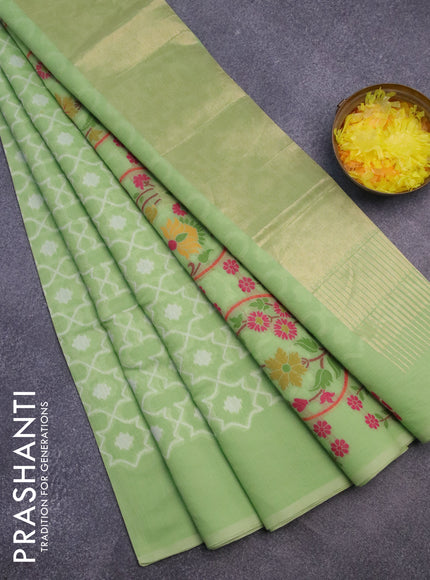 Munga cotton saree pista green with allover thread weaves and simple border