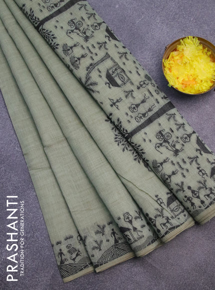 Munga cotton saree pastel green with thread woven warli buttas and warli design thread woven border