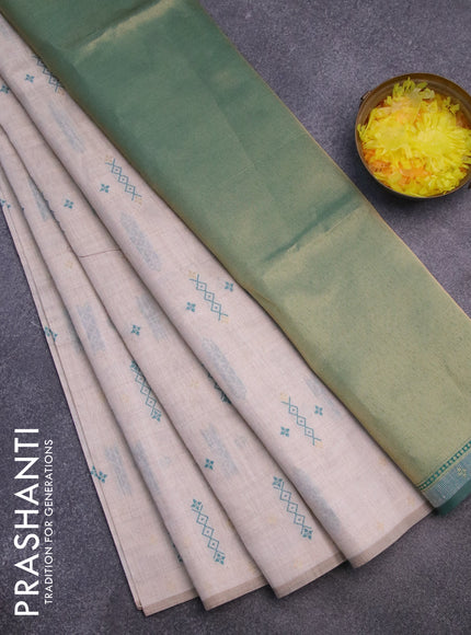 Munga cotton saree beige and teal green with allover thread weaves in borderless style