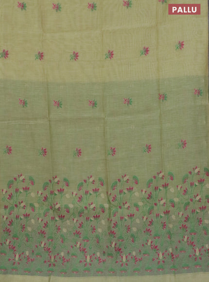 Munga cotton saree pista green with thread woven floral buttas in borderless style