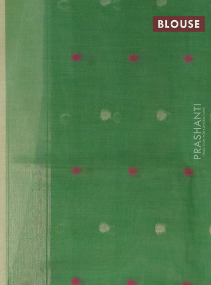 Munga cotton saree pista green with thread woven floral buttas in borderless style