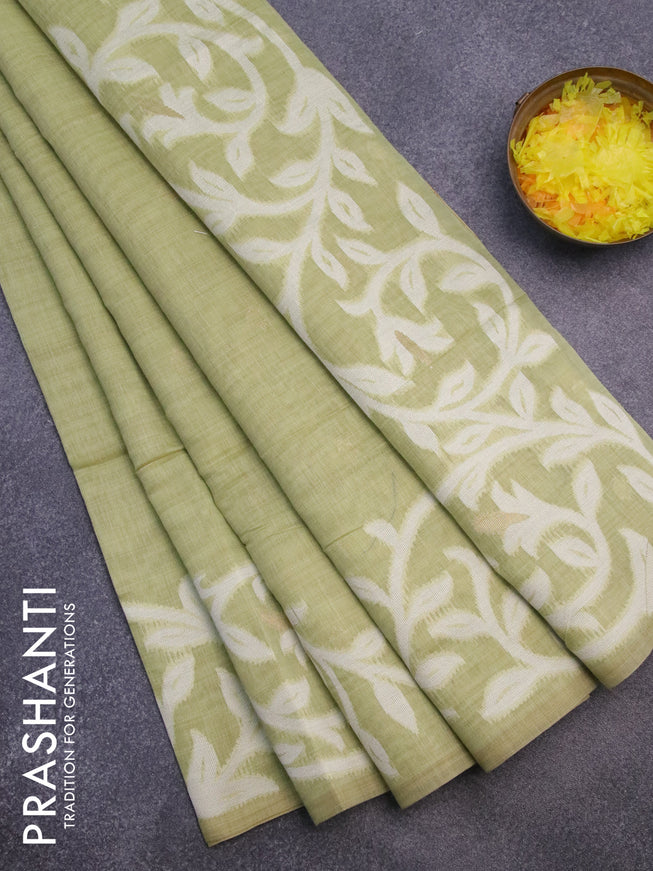 Munga cotton saree pista green with thread & zari woven buttas in borderless style