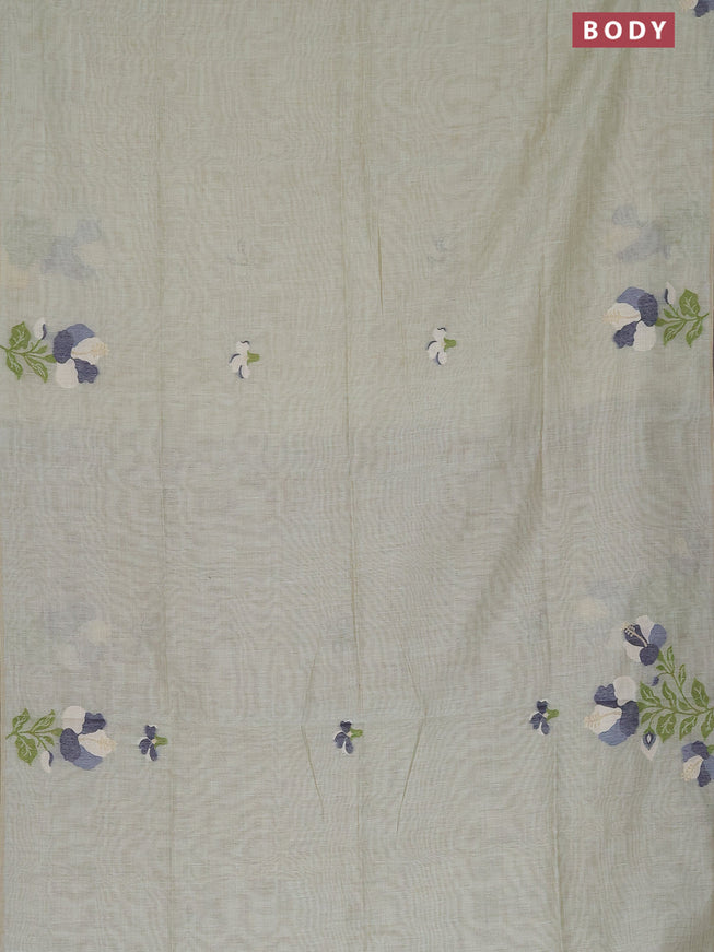 Munga cotton saree pastel green shade and navy blue with thread & zari woven floral buttas in borderless style