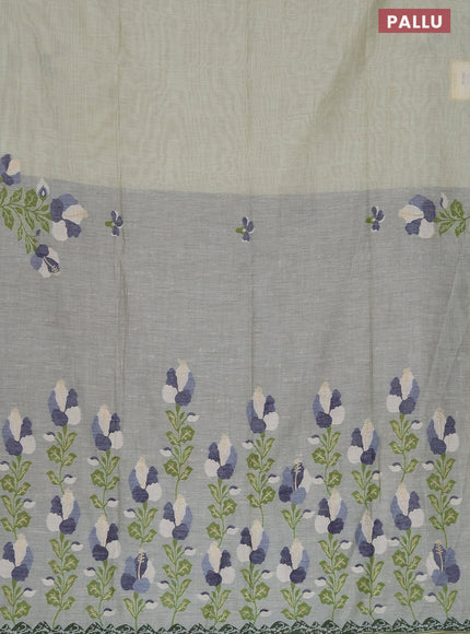 Munga cotton saree pastel green shade and navy blue with thread & zari woven floral buttas in borderless style