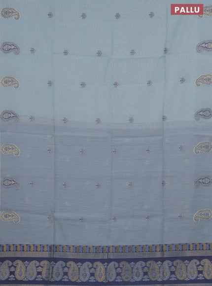 Munga cotton saree pastel green shade and dark blue with thread & zari woven buttas in borderless style