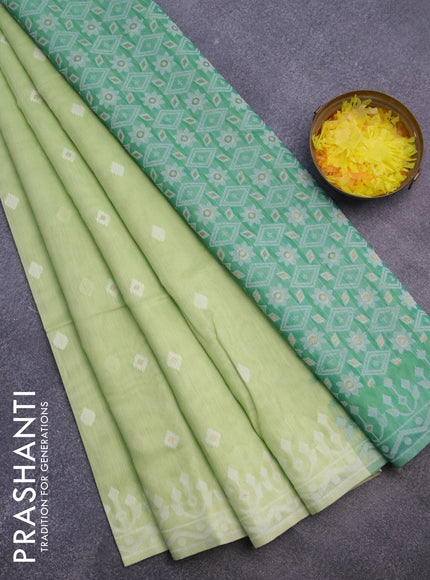 Munga cotton saree pista green and green with thread & zari woven buttas and thread woven border