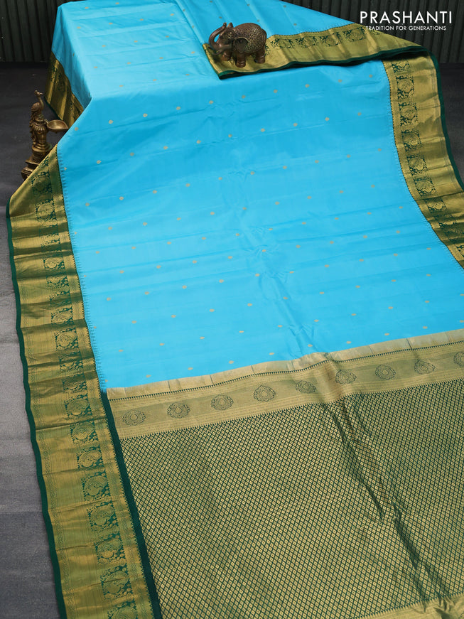 Pure gadwal silk saree light blue and green with zari woven buttas and annam zari woven border