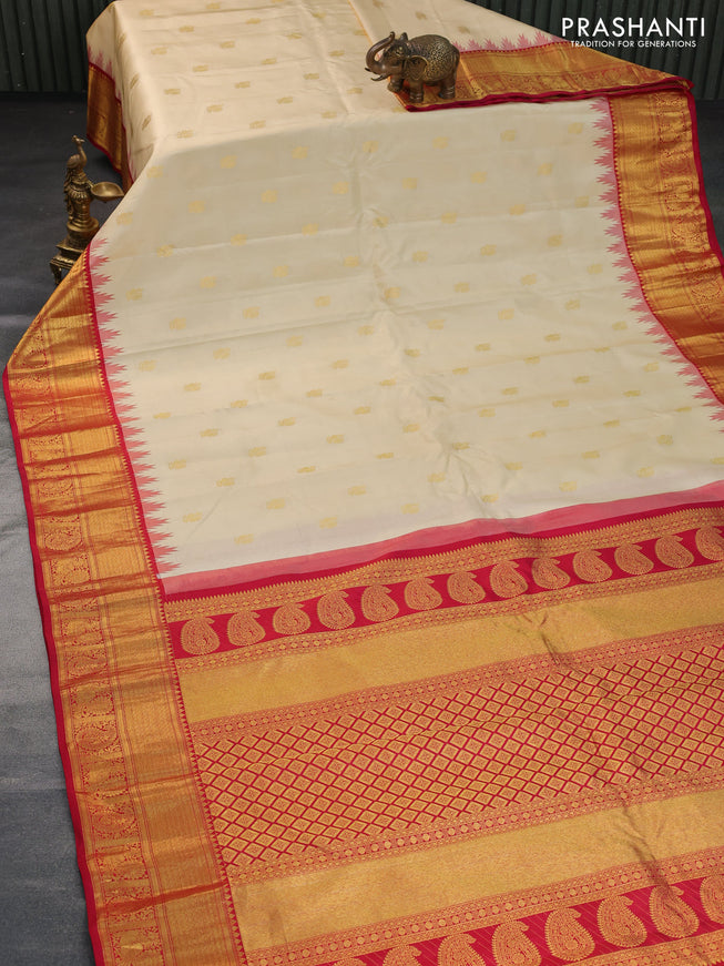 Pure gadwal silk saree sandal and dual shade of pink with annam zari woven buttas and temple design zari woven border