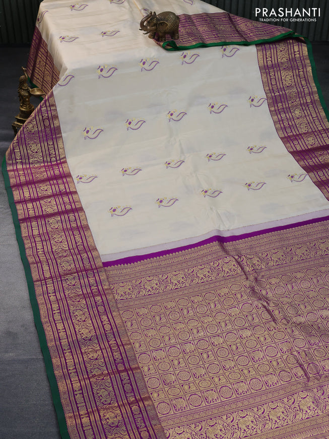 Pure gadwal silk saree off white and purple with thread & zari woven buttas and long zari woven border