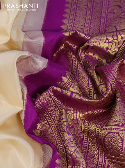 Pure gadwal silk saree off white and purple with thread & zari woven buttas and long zari woven border