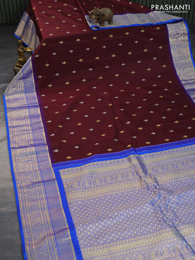 Pure gadwal silk saree deep maroon and blue with silver & gold zari woven buttas and long zari woven border