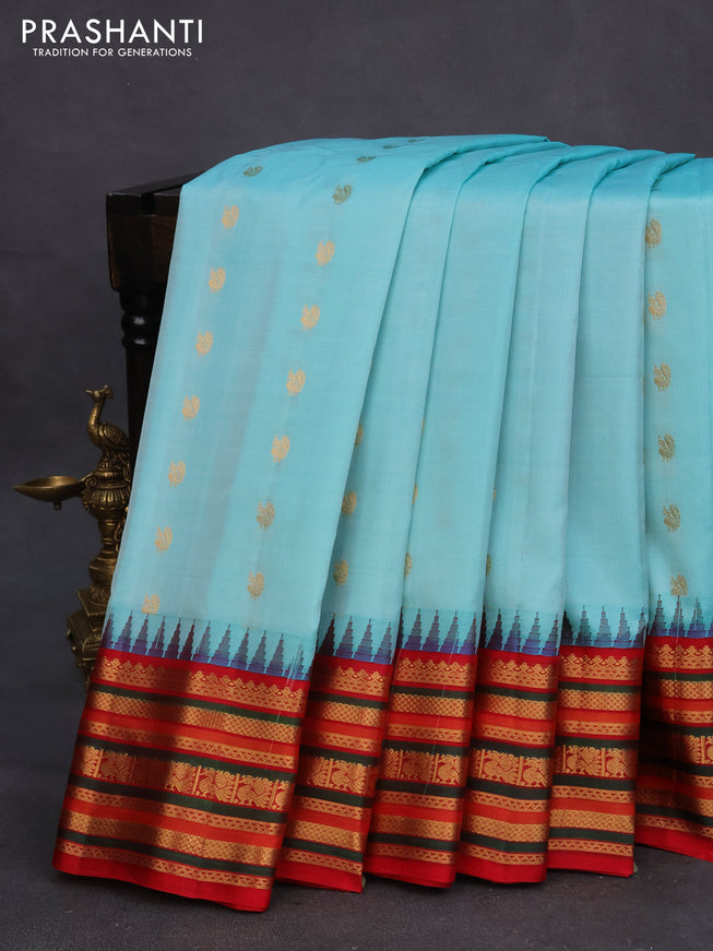 Pure gadwal silk saree light blue and red with annam zari woven buttas and temple design zari woven border