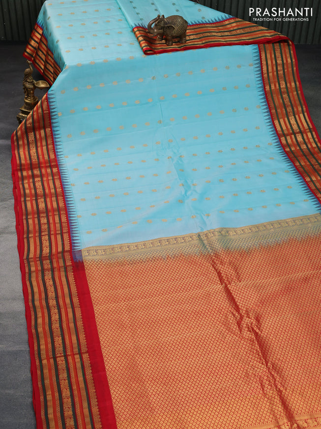 Pure gadwal silk saree light blue and red with annam zari woven buttas and temple design zari woven border