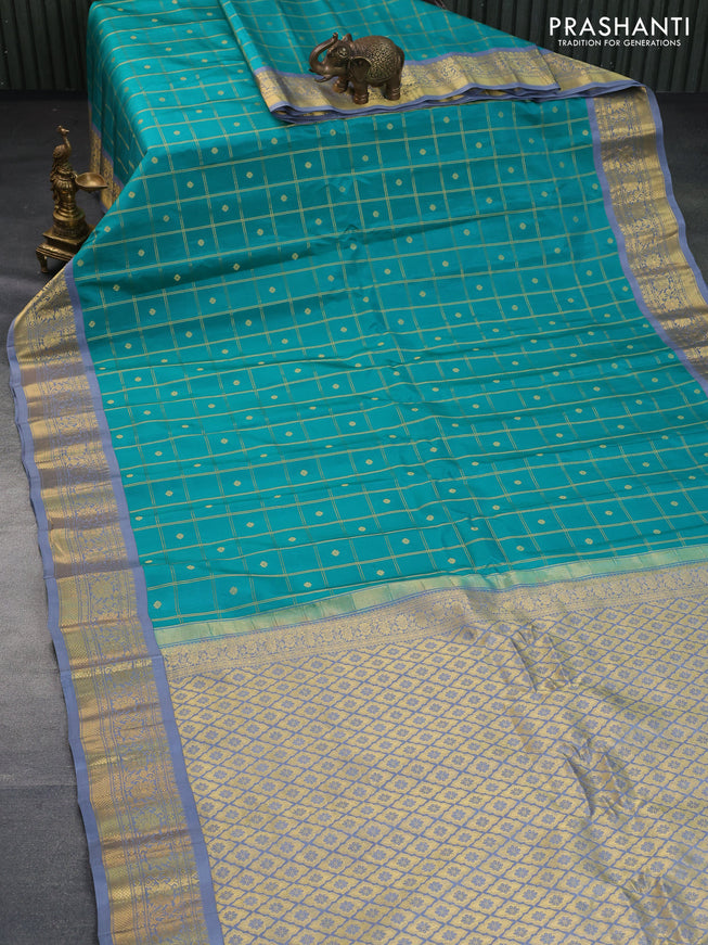 Pure gadwal silk saree teal green and grey with allover zari checks & buttas and zari woven border