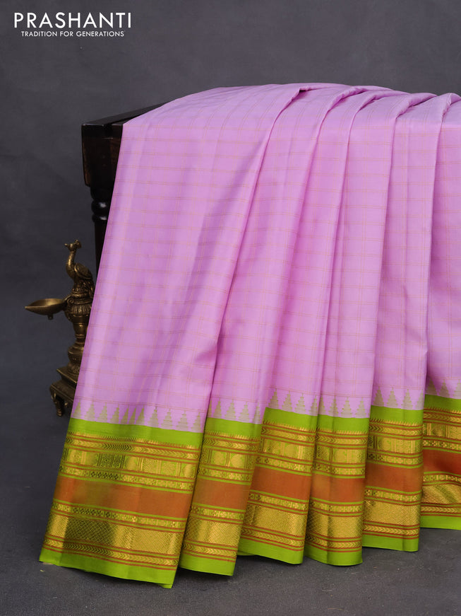 Pure gadwal silk saree lotus pink and lime green with allover zari checks & buttas and temple design zari woven border