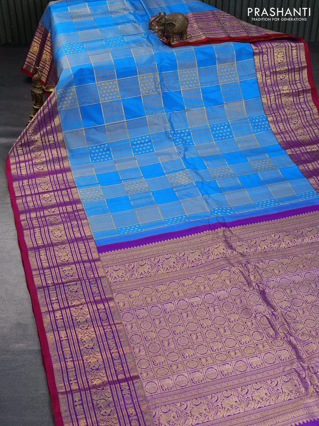 Pure gadwal silk saree cs blue and purple with allover zari weaves and long zari woven border