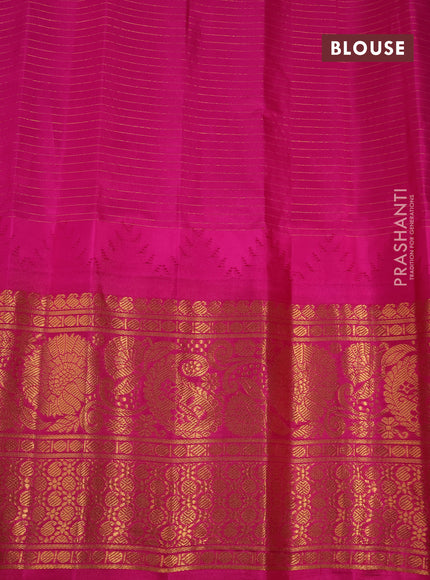 Pure gadwal silk saree blue and pink with allover zari checks & buttas and temple deisgn zari woven border