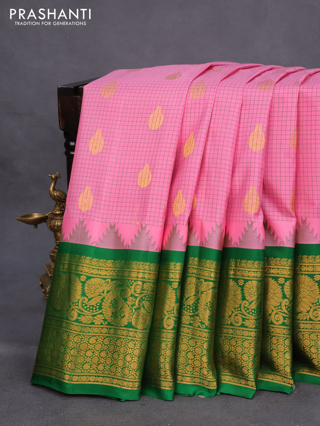 Pure gadwal silk saree light pink and green with allover checked pattern & zari buttas and temple deisgn long zari woven border