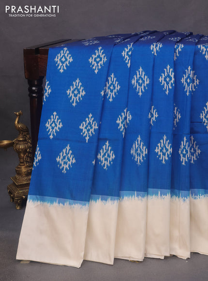 Pochampally silk saree cs blue and off white with ikat butta weaves and simple border